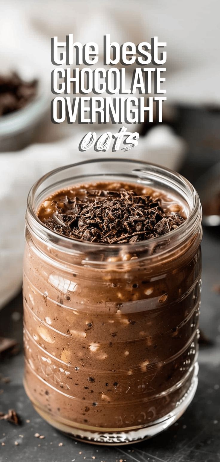 a jar filled with chocolate overnight pudding on top of a table