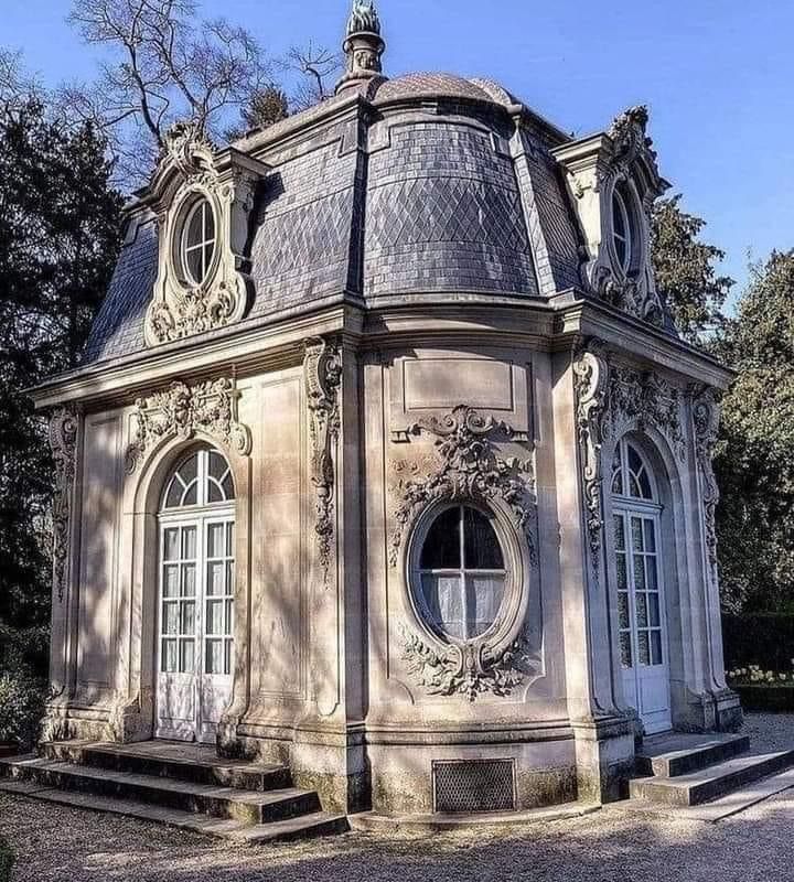 an old building with a dome on top