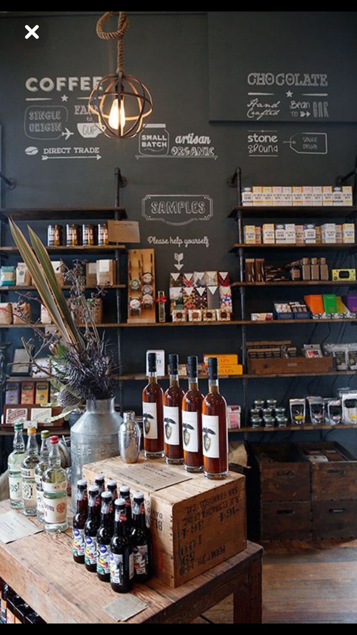 a coffee shop with lots of bottles on the counter