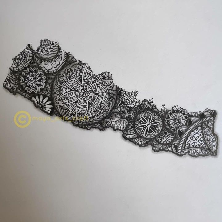 an intricate lace design on a white wall