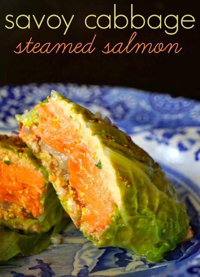 a plate with some food on it and the title says savoy cabbage steamed salmon