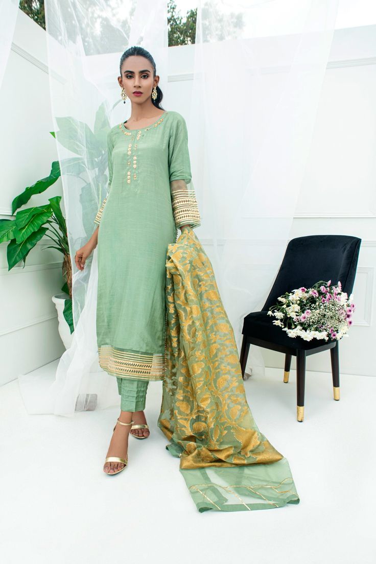 Embroidered Slub Silk Palazzo Set For Navratri, Embroidered Slub Silk Palazzo Set, Green Slub Silk Traditional Wear With Resham Embroidery, Embroidered Slub Silk Palazzo Set With Traditional Drape, Designer Raw Silk Palazzo Set With Dori Work, Eid Slub Silk Palazzo Set With Resham Embroidery, Eid Chanderi Palazzo Set With Gota Work, Traditional Slub Silk Churidar With Dabka Work, Semi-stitched Silk Kurta With Gota Work