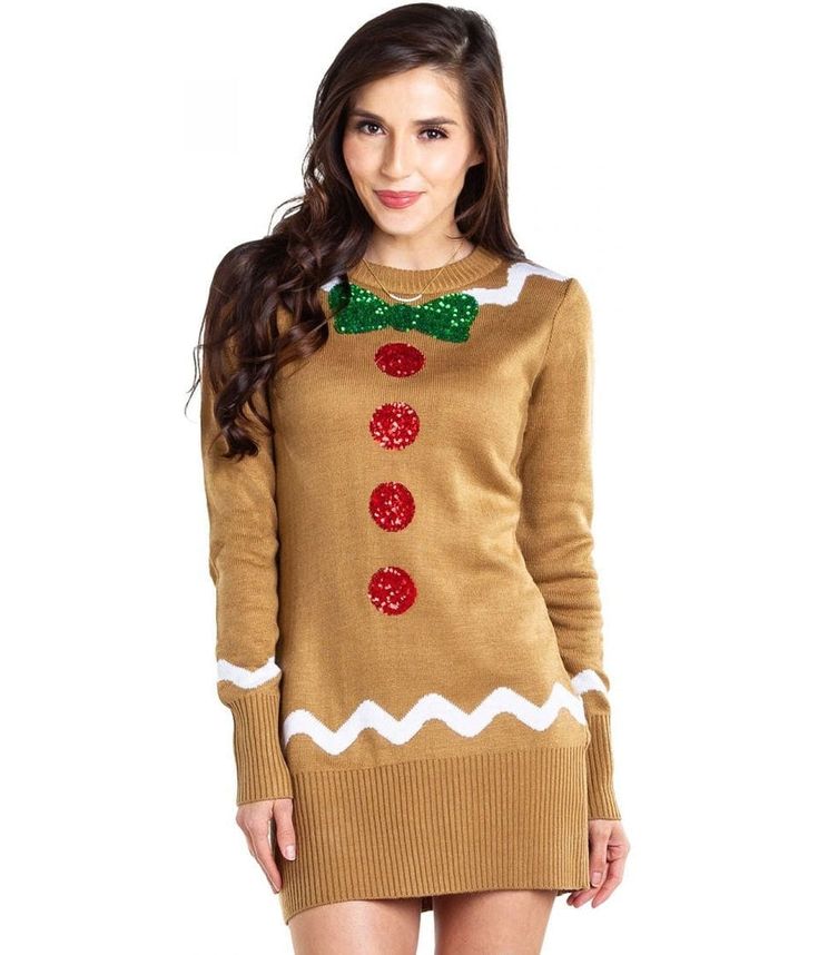 a woman wearing a brown sweater with a green bow tie and snowman on it