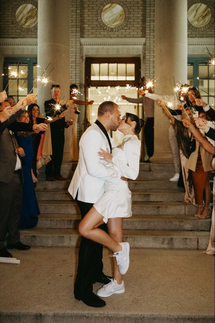 Wedding sparkler photos, wedding sparklers, wedding send off, wedding send off photos, bridal sneakers, bridal tennis shoes, Reception dress, wedding dress, wedding, bride, unique reception dress, reception dress idea, reception dress inspo, modern wedding, classic wedding, engagement photo dress, engagement photos, house of cb dress, engagement photo outfit, engagement photo ideas Wedding Send Off Dress Short, Wedding Dress Change Receptions, Bride Reception Dress With Sneakers, Wedding Reception Tennis Shoes, Reception Dress And Sneakers, Reception Dress Sneakers, Wedding After Party Sneakers, Second Wedding Dress For Dancing, Bride After Party Outfit Casual