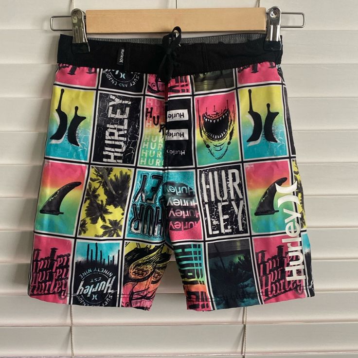 Swimming Trunks Never Worn!! Excellent Quality. Vibrant Colors!! Boys Size 6. Open To Offers Playful Black Beach Shorts, Multicolor Graphic Print Shorts For Beach Season, Playful Black Bottoms For The Beach, Playful Black Shorts For Summer, Playful Graphic Print Beach Bottoms, Pink Graphic Print Shorts For Summer, Pink Summer Surfing Shorts, Beach Bottoms With Multicolor Graphic Print, Multicolor Graphic Print Beach Bottoms