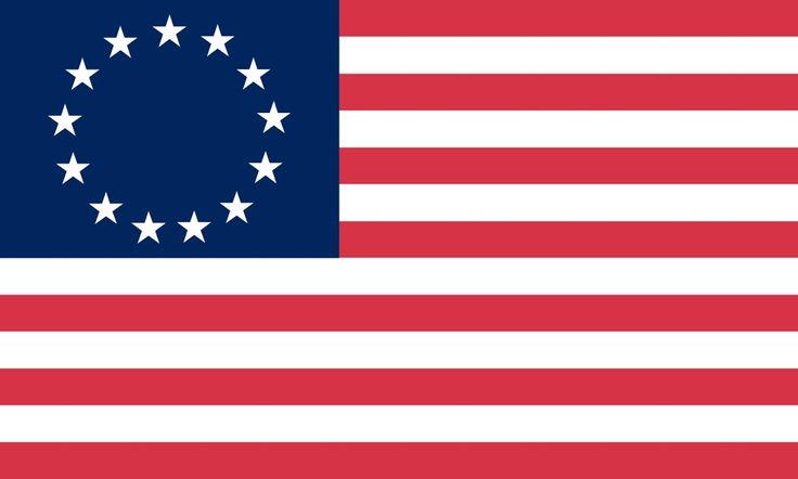 an american flag with stars and a circle in the center on it's side