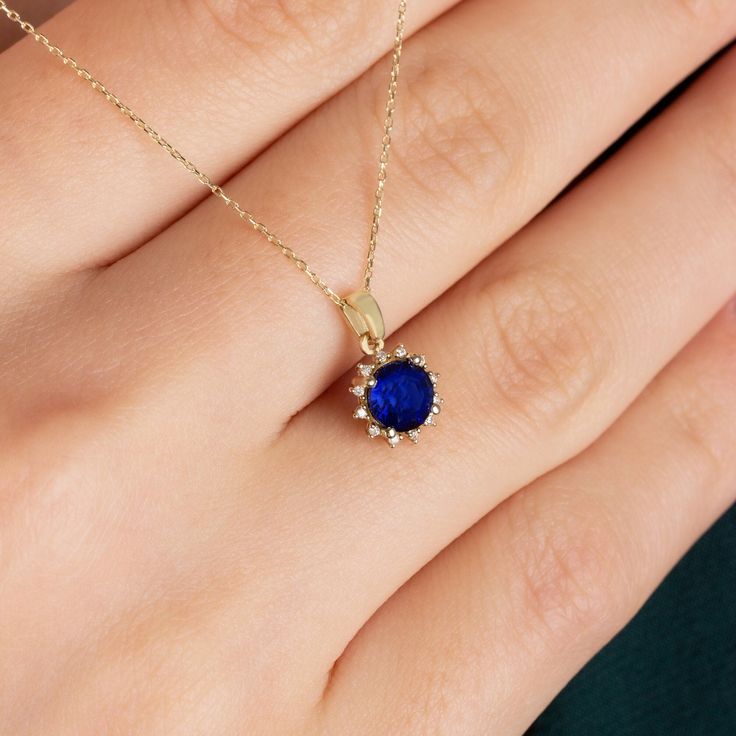 "Our 14k solid gold round sapphire necklace surrounded by diamonds will make your loved one happy... 🤍🤍 Special gifts for your special moments. We produce our jewelery for you in the most perfect way. 🤍🤍 All of our products are carefully crafted from 14k Solid gold and Real diamonds. 🤍🤍 High Quality Natural Processed Sapphire. FEATURES * Made to order. * Gold Color Selection: Yellow Gold, Rose Gold, White Gold * Gold KT: 14K * Length: 14\", 16\", 18\", 20\", 22\",24\" * Gemstone: Genuine D Yellow Gold Cubic Zirconia Birthstone Necklace, Anniversary Necklace With Lab-created Sapphire Birthstone, Diamond Cut Sapphire Necklace For Gift, Anniversary Lab-created Sapphire Diamond Cut Necklaces, Sapphire Necklace With Diamond Cut As Gift, Anniversary Diamond Cut Sapphire Necklaces, Sapphire Diamond Cut Necklace For Gift, Anniversary Sapphire Necklace With Diamond Cut, Anniversary Diamond Cut Lab-created Sapphire Necklace