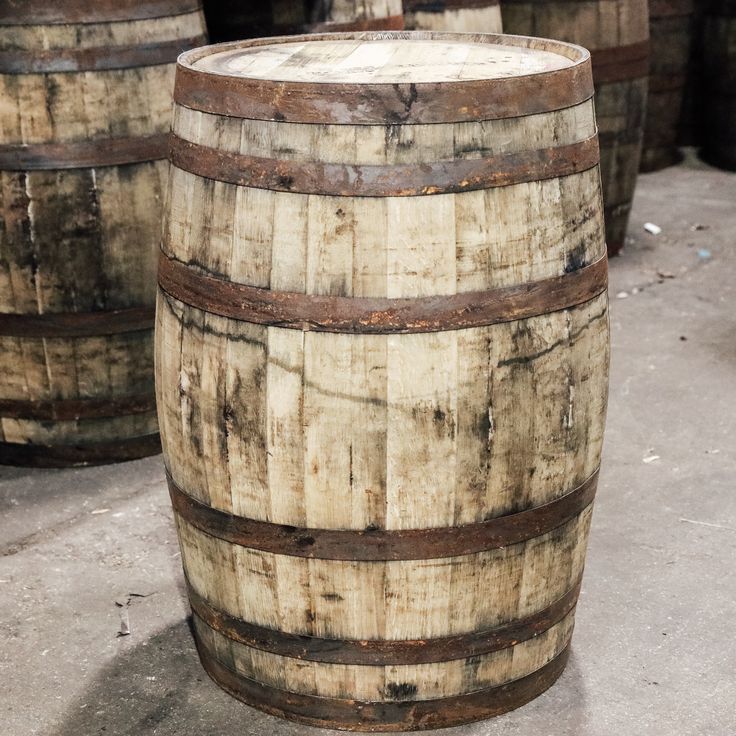 several wooden barrels stacked on top of each other