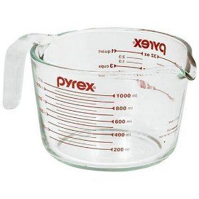 a measuring cup with a handle on it