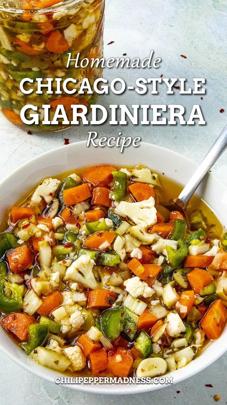 a white bowl filled with vegetables next to a jar of pickled peppers and carrots