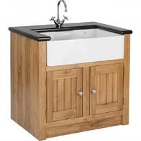 a wooden sink cabinet with a black counter top