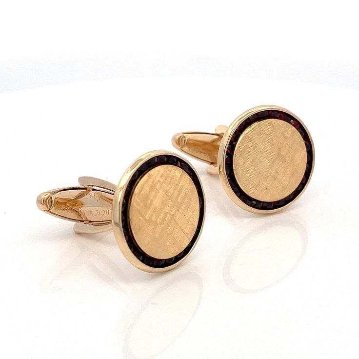 Designer Lucien Piccard 14k Yellow Gold and Garnet Cufflinks~ Vintage Gift For Him~ ET1127 Elevate his style with our Vintage Lucien Piccard 14k Yellow Gold and Garnet Cufflinks. These exquisite accessories exude sophistication and charm. A perfect gift for him, these cufflinks add a touch of luxury to any formal attire.  Metal Content: 14k Yellow Gold Gemstones: 42 Rose Cut Round Garnets Carats; 1.26 ctw Measurements Face of Cufflink: 18mm Weight: 10.91 Grams Stamps:  Lucien Piccard 14K Conditi White Gold Cufflinks For Business, Luxury Formal Jewelry With Polished Finish, Luxury Polished Finish Jewelry For Formal Occasions, Luxury Polished Cufflinks For Formal Occasions, Luxury Polished Finish Cufflinks For Formal Occasions, Round Screw Back Cufflinks For Business, Luxury Engraved Cufflinks For Business, Luxury Polished Jewelry For Business, White Gold Polished Jewelry For Business