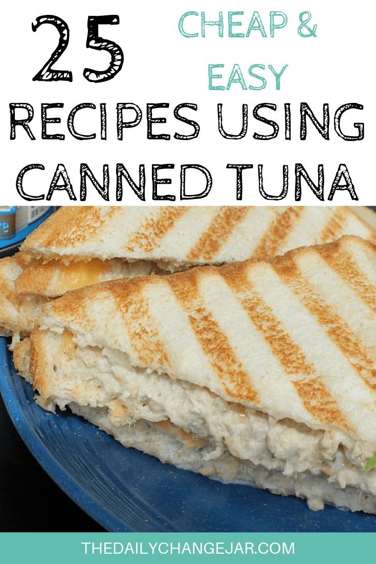 a sandwich cut in half on a blue plate with the words 25 cheap and easy recipes using canned tuna