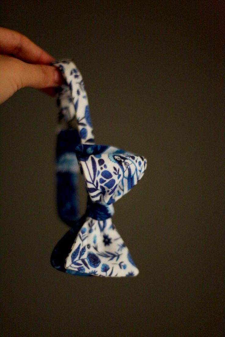 Virgin Mary Bow Tie for Boys Order this very special religious and handmade bow tie for your boy's special First Reconciliation, First Communion party or Marian holiday. The two-sided tie is made with blue, light blue, and white Our Lady of Guadalupe lightweight cotton twill (5.8 oz/yd) and light weight Our Lady of Lourdes fabric.      Our Lady of Lourdes Bowtie -100% Cotton Twill  (Fabrics designed by Abigail Halpin) (The fabric is pre-shrunk and washed in baby detergent.) -Clip enclosure     P Blue Tie With Bow Tie Back As A Gift, Blue Bow Tie As A Gift, Blue Bow Gift For Summer, Blue Standard Bow Tie For Father's Day, Pre-tied Butterfly Knot Bow As Gift, Adjustable White Tie With Satin Bow, Blue Bow Tie For Father's Day, Blue Bow Ties For Gifts, Pre-tied Decorative Bow For Gifts