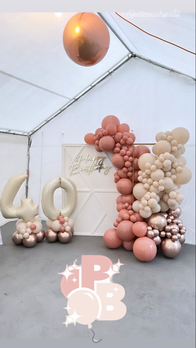 balloons are arranged in the shape of letters