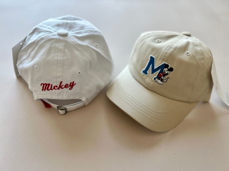 Embroidered Mickey Mouse M Logo. "Mickey" Embroidered on back. Adjustable Strap. 52cm Head Circumference (~3-5y) Disney Items are Final Sale. Mickey Hat, Disney 2025, Disney Items, Kids Hat, M Logo, Kids Hats, Toddler Kids, Baseball Hat, White Beige