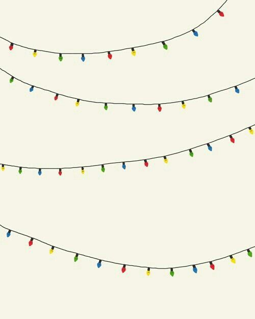 a string of christmas lights on a white background