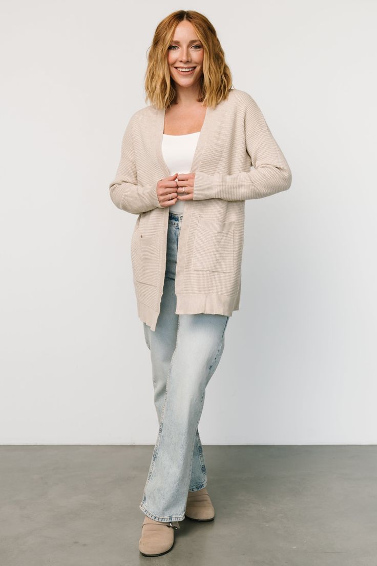 Perfect, easy-to-pair cardigan Oatmeal beige color Waffle knit material has stretch Open cardigan style Functional pockets Mid-weight feel Ribbing at front, sleeve cuffs, and hem 52% Viscose, 28% Polyester, 20% Nylon Marianne is 5'6, cup size 34D, size 6 and wearing size S Waffle Cardigan, Baltic Born, Cardigan Style, Beige Cardigan, Cardigan Fashion, Portsmouth, Open Cardigan, Cup Size, Knitting Materials