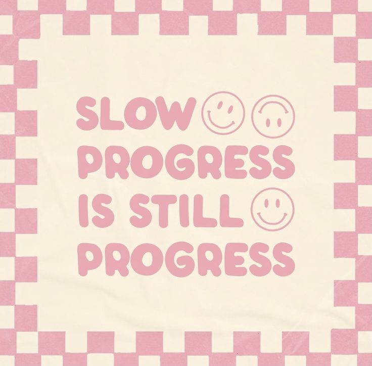 the words slow progress is still progress on a pink and white checkered tablecloth