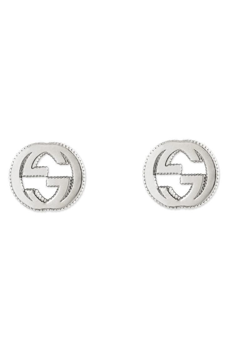 The iconic interlocking-G logo is outlined in texture on stud earrings that complete your look with Italian elegance and shine. Style Name:Gucci Silver Interlocking-G Stud Earrings. Style Number: 5536899. Available in stores. Gucci Earrings, Buy My Clothes, Jewel Frames, How To Look Expensive, Gold Diamond Hoop Earrings, Italian Elegance, Gold Topaz, Lana Jewelry, Strap Sandals Women