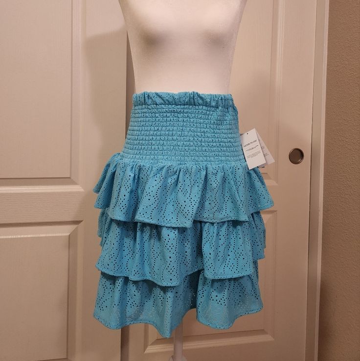 Cute And Flirty Turquoise Ruffle Skirt By Michael Kors. New With Tags (Never Worn). Has Another Layer Underneath So It's Not See-Through. Elastic Waistband. Blue Stretch Ruffle Skort, Blue Ruffled Stretch Skort, Chic Blue Tiered Bottoms, Tiered Blue Skirt With Ruffles, Blue Tiered Skirt For Summer, Blue Skirted Bottoms With Ruffles, Skirted Blue Bottoms With Ruffles, Blue Ruffled Skort, Chic Blue Tiered Skirt