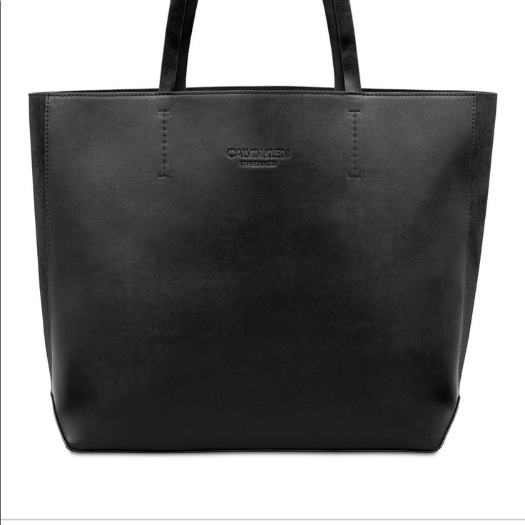 Calvin Klein Tote Bag Chic Black Bags For On-the-go, Calvin Klein Leather Shoulder Bag With Adjustable Strap, Calvin Klein Rectangular Bag With Adjustable Strap, Calvin Klein Classic Shoulder Bag, Classic Calvin Klein Leather Bags, Classic Calvin Klein Satchel Shoulder Bag, Classic Calvin Klein Shoulder Bag For Daily Use, Calvin Klein Adjustable Strap Shoulder Bag, Calvin Klein Rectangular Shoulder Bag