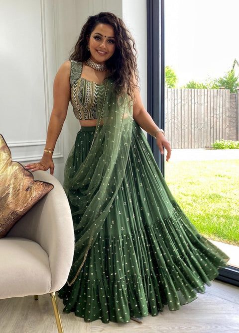 Dress For Marriage Function, Dress For Marriage, Dark Green Lehenga, Green Lehenga Choli, Ruffles Bridesmaid Dresses, Marriage Function, Lehenga Choli Designs, Bridesmaid Lehenga, Tiered Tulle Skirt