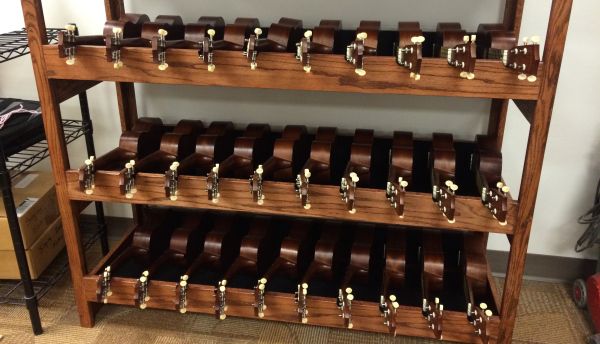 a wooden shelf filled with lots of chocolates