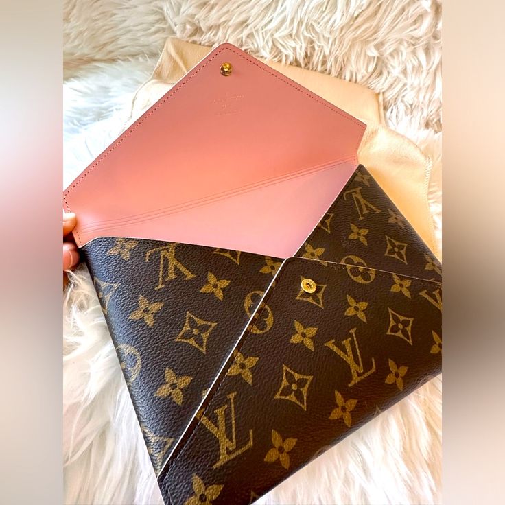 Brand New. No Signs Of Use. Authenticity Guaranteed By Poshmark Authentic Louis Vuitton Pochette Kirigami Large. Monogram With Rose Ballerine Pink Cowhide Leather Lining. 23x16.5cm. Overall Condition: Excellent Interior : Brand Newexterior: Brand Newhardware: No Signs Of Use Datecode : Sp1168 (Made In France) Packaging: Dustbag Designer Envelope Clutch For Daily Use, Designer Travel Envelope Clutch, Designer Envelope Clutch For Travel, Elegant Pink Monogram Canvas Bag, Luxury Pink Clutch, Luxury Pink Clutch For Travel, Pink Envelope Bag For Travel, Pink Envelope Travel Bag, Pink Envelope Clutch For Formal Occasions