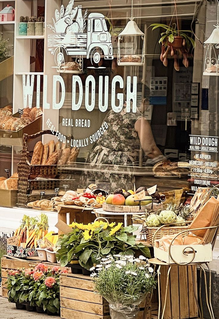 a store front with many different types of food on display