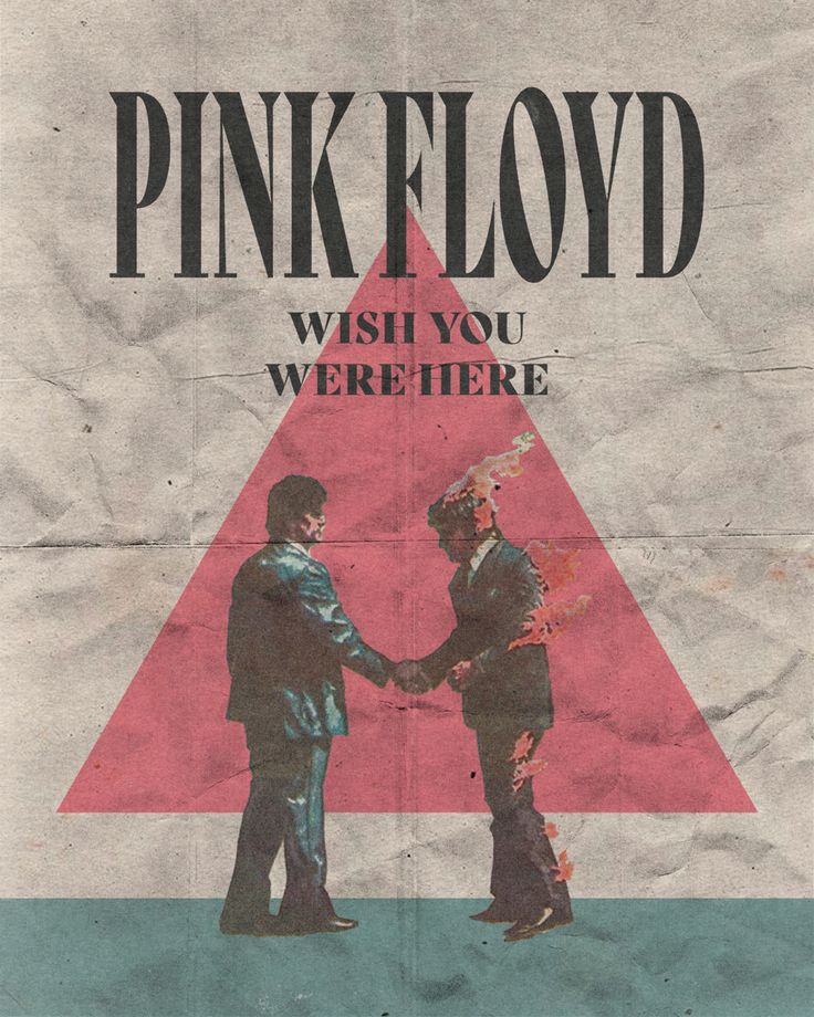 two men shake hands in front of a pink floyd poster that reads, wish you were here