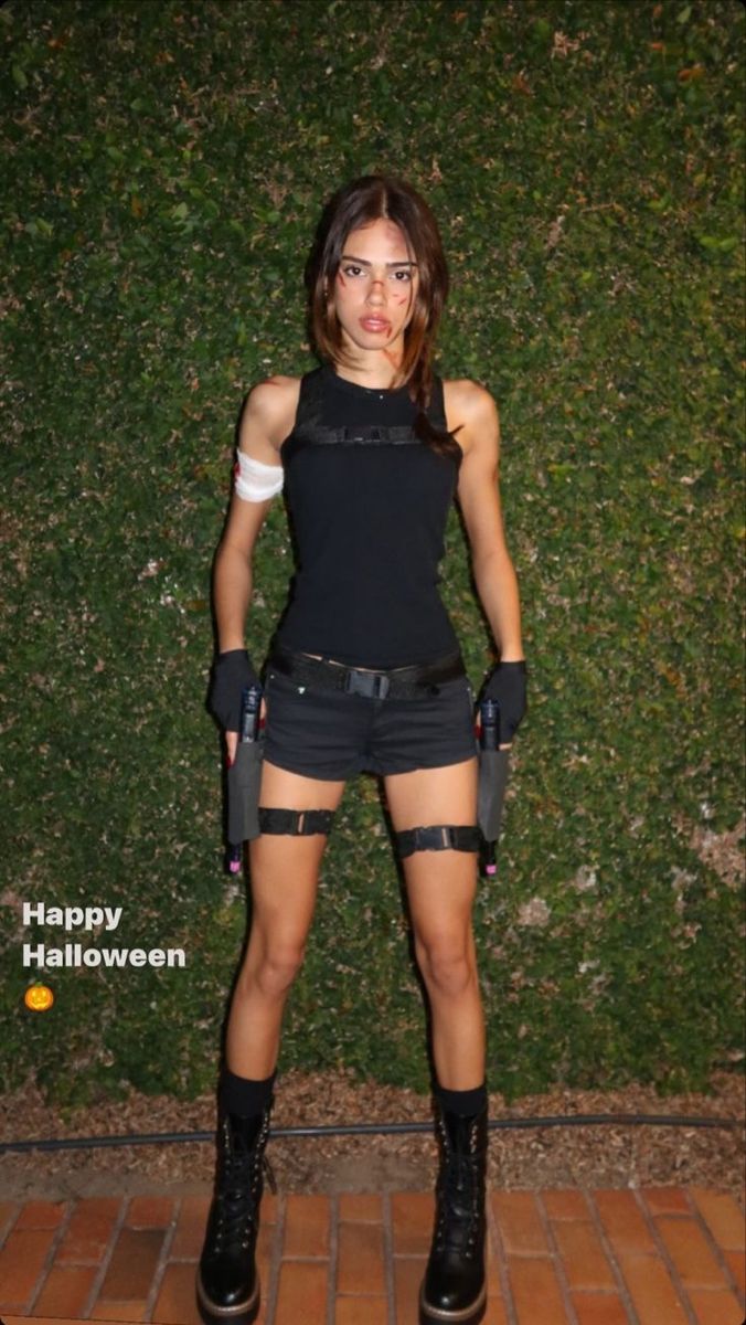 Lara Croft outfit 
Lara Croft Halloween costume 
nottrebeca_ 
nottrebeca Halloween Costume Leather Jacket, Indiana Jones Makeup, Explorer Costume Woman, Halloween Costumes Women Aesthetic Dark, Tomb Rider Costumes, Dress Up Party Ideas Costumes, 2025 Halloween Costumes, Brunette Costumes Halloween, Biker Costume Women Halloween