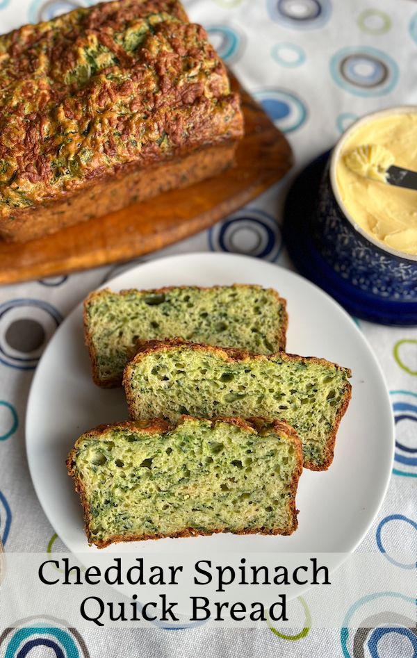 slices of bread on a plate next to butter