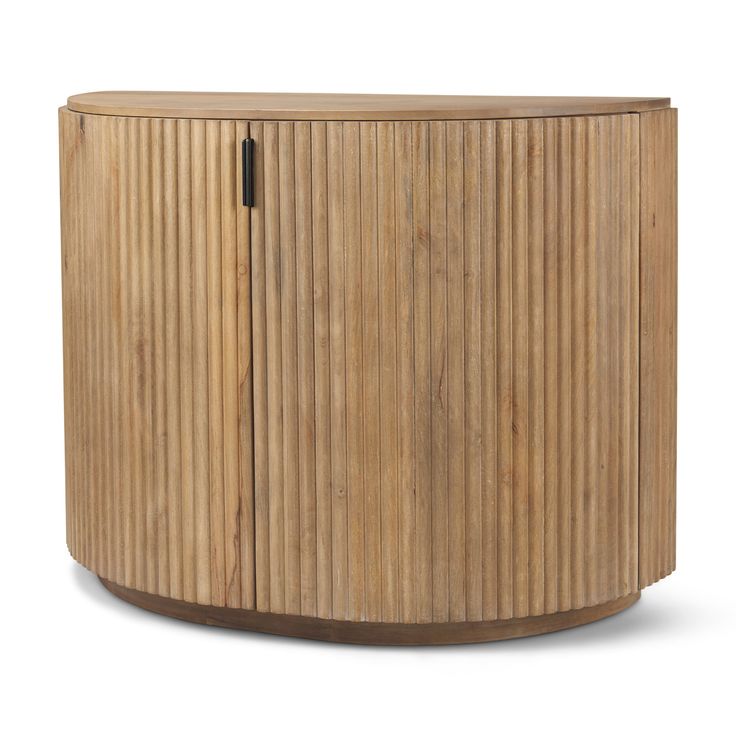 a round wooden cabinet with black handles