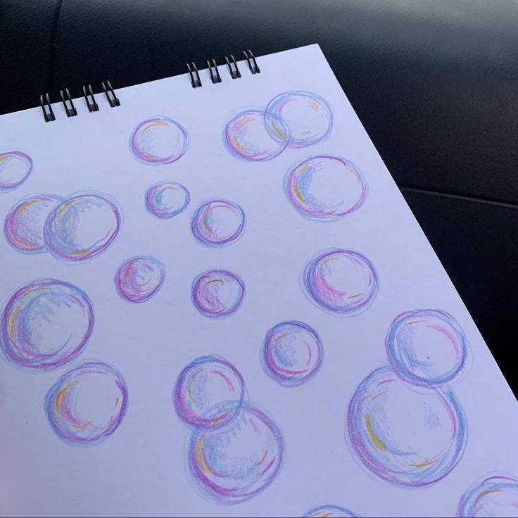 a drawing with colored circles on it