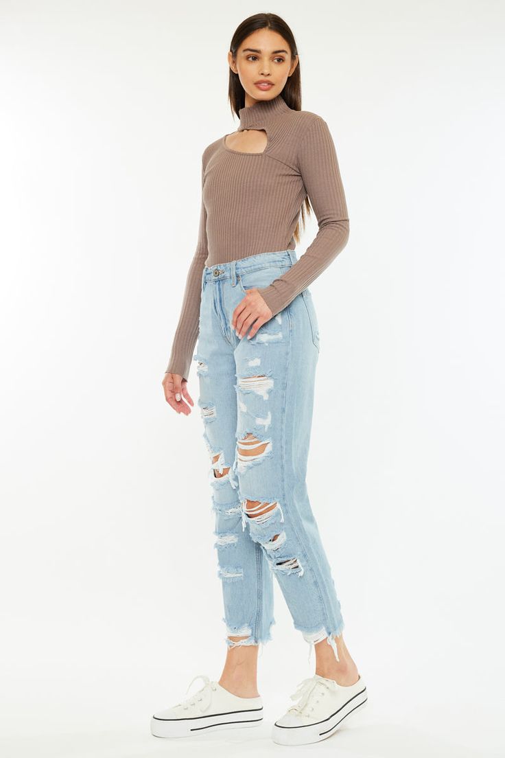 Light wash denim with moderate destruction and a raw hem for a lived-in look that feels comfortable and stylish. Our Giovanna High Rise Jeans come with subtle fading on the front and back and heavily distressed details to give these jeans a rugged yet trendy vibe. Sits high above the natural waistline as its fit relaxes through the thigh and leg. Comes in rigid non-stretch denim for that authentic jean vibe with a classic 5-pocket design, single-button front, and zip-fly closure. 11" Rise / 27" Inseam (size 5/26) 100% Cotton Model in size 25 Style # : KC8691L Stretchiness Level >> Stretch SIZE WAIST HIP 0 / 23 26" 35" 1 / 24 27" 36" 3 / 25 28" 37" 5 / 26 29" 38" 7 / 27 30" 39" 9 / 28 31.5" 40.5" 11 / 29 33" 42" 13 / 30 34.5" 43.5" 15 / 31 36" 45" High Rise Distressed Cropped Jeans In Denim Blue, Ripped Medium Wash Cropped Jeans For Fall, Distressed Cropped Denim Jeans For Fall, Faded Distressed Jeans For Spring, Trendy Ripped Cropped Jeans In Medium Wash, Trendy Ripped Medium Wash Cropped Jeans, Casual Ripped Medium Wash Cropped Jeans, Distressed Cutoff Cropped Jeans For Fall, Distressed Medium Wash Cropped Jeans