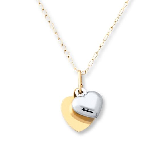 A three-dimensional 14K white gold heart is paired with a 14K yellow gold heart disc in this lovely children's necklace. The pendants hang from a 13-inch link chain that secures with a spring ring clasp. Gold Layered Bracelets, Pearl Diamond Jewelry, Heart Disc, Cross Jewelry Necklace, Fan Jewelry, Gold Stock, Jewelry Education, Jewelry Advice, Jared The Galleria Of Jewelry