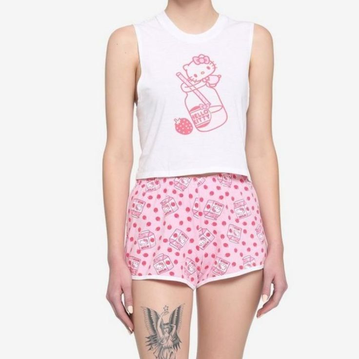 Hello Kitty Strawberry Milk Tank & Shorts Girls Lounge Set Hello Kitty Is Here To Keep You Cool And Refreshed! Relax With Sweet Style In This Adorable Lounge Set. It Includes A White Muscle Tank Featuring A Print Of Hello Kitty On Top Of A Bottle Of Strawberry Milk. The Matching Pink Shorts Feature An Allover Strawberry And Strawberry Milk Carton Print, And Come With An Elasticated Waistband For Comfort. Top: 100% Cotton Shorts: 95% Cotton; 5% Spandex Wash Cold; Dry Low Imported Listed In Junior Kawaii Cotton Summer Bottoms, Kawaii Cotton Bottoms For Summer, Kawaii Style Cotton Bottoms For Summer, Kawaii Cotton Sleepwear For Summer, Cute Short Sleepwear For Pajama Party, Cute Short Sleepwear For Loungewear, Cute Short Length Sleepwear For Pajama Party, Cute Cotton Short Sleepwear, Cute Cotton Sleepwear Short Length