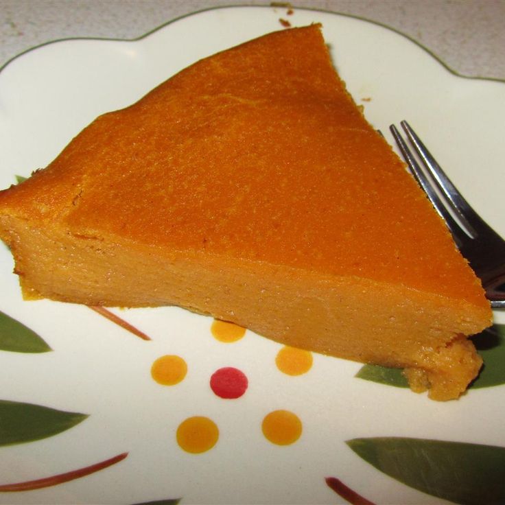 a piece of pie on a plate with a fork