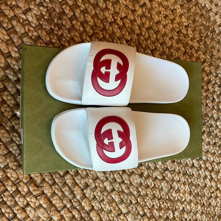 Brand New, Never Worn, Size U.S. 8 Mens, White And Red, Comes With Original Box, Tags, And Shoe Covers ***Could Be Worn As A Womens Size 9*** Gucci Slides For Summer Beach, Gucci Casual Slides For Summer, Gucci Summer Slides With Round Toe, Gucci Casual Slides For Spring, Gucci Casual Beach Slides, Casual Gucci Slides For The Beach, Gucci Slip-on Slides For Spring, Gucci Spring Slip-on Slides, Gucci Casual Open Toe Slides