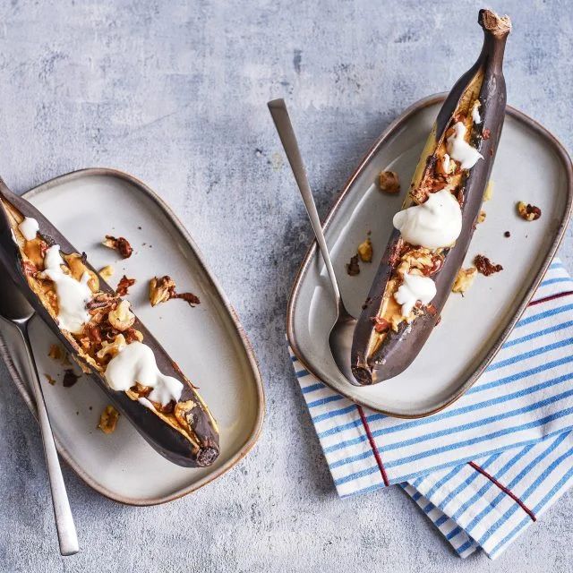 two plates filled with desserts on top of each other