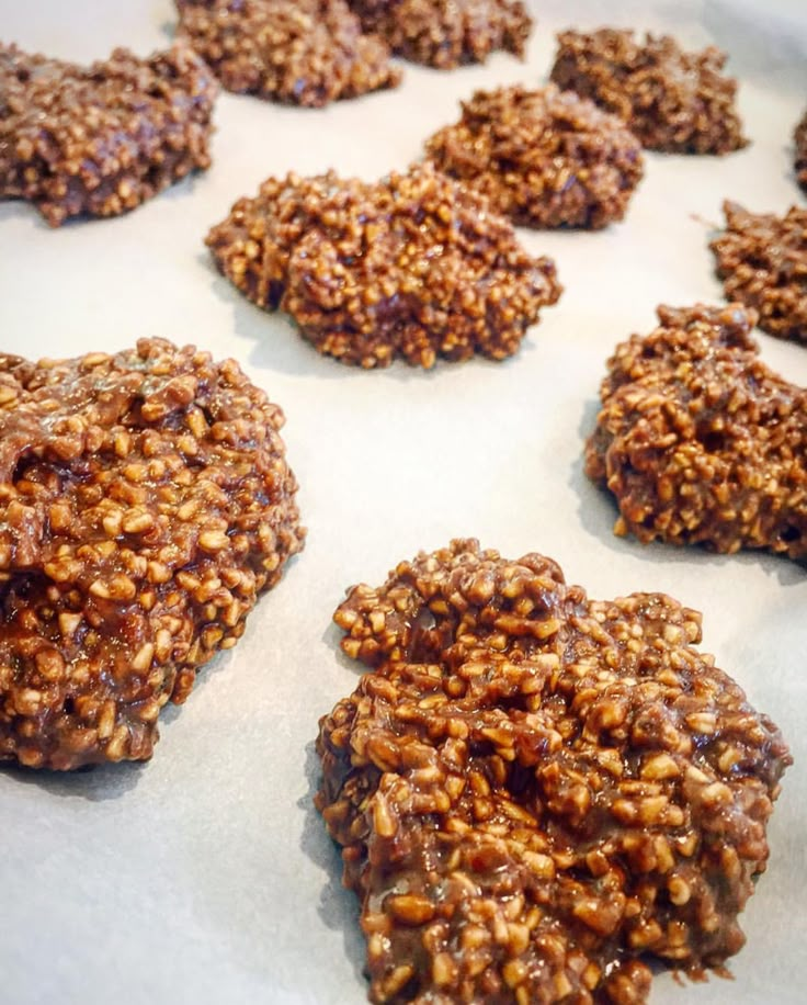 cookies are arranged on a baking sheet and ready to be baked in the oven for consumption