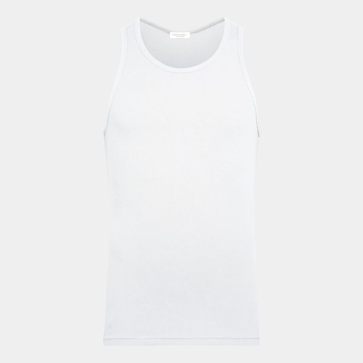 Elevate your style with this pristine tank top, tailored for a sleek silhouette with comfortable arm openings and a minimalist design, ideal for versatile layering or standalone grace. Oversized White Cardigan, Brown Crewneck, Purple Crewneck, Navy Crewneck, Grey Turtleneck, White Turtleneck, White Crewneck, Grey Crewneck, Black Crewneck