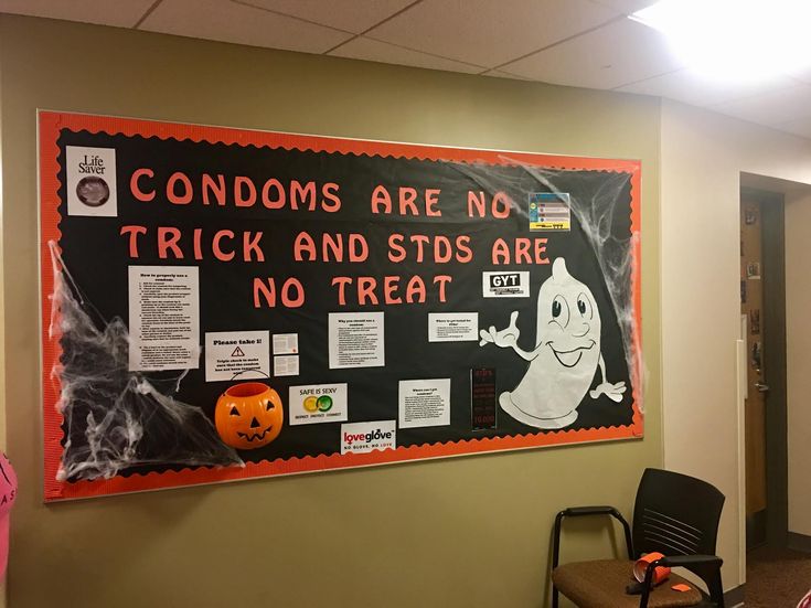 a sign on the wall that says, condoms are no trick and stds are not treat