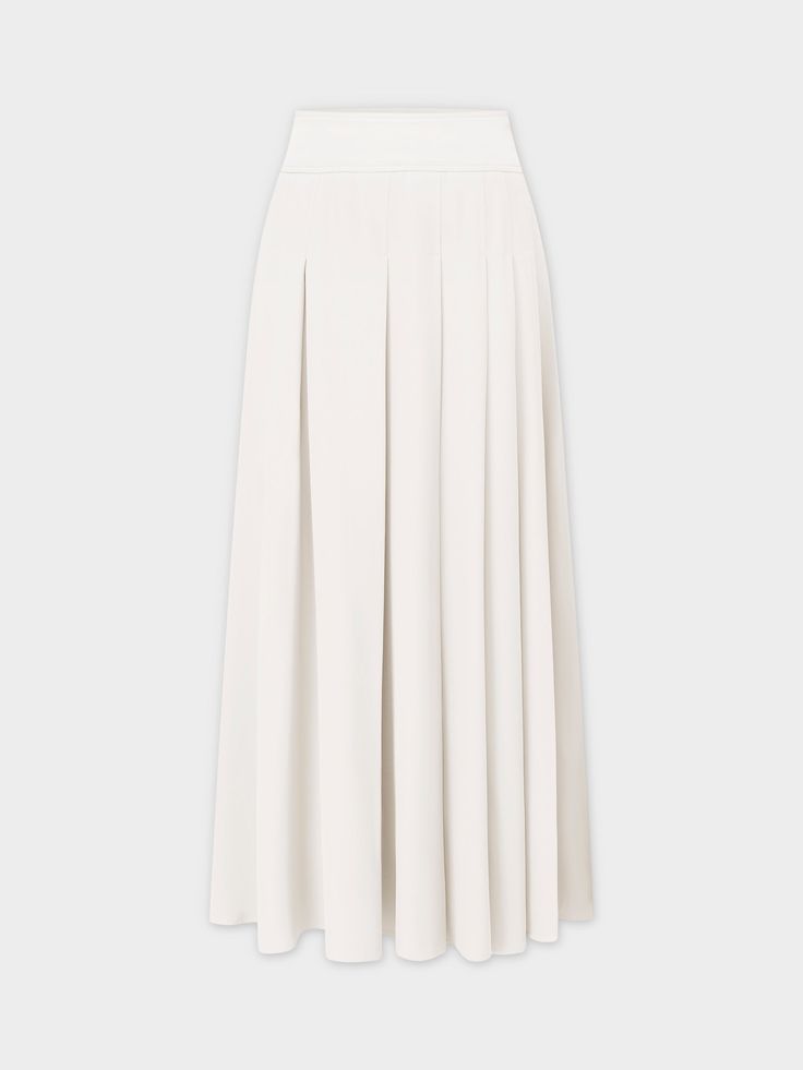 Experience effortless style with our Yolk Pleated Skirt in a classic white hue. The 37" length provides elegant coverage, while the pleated design adds texture to your look. White Relaxed Skirted Bottoms, Classic A-line Skirt For Daywear, Relaxed White Skirted Bottoms, White Fitted Daywear Skirt, White Fitted Skirt For Daywear, Formal Long Cream Skirt, Elegant A-line Maxi Skirt With Pleated Hem, Elegant Cream Lined Skirt Bottoms, Elegant Lined Cream Skirt