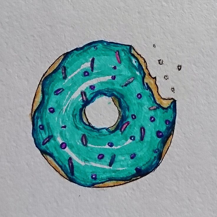 a drawing of a blue donut with sprinkles on it's side