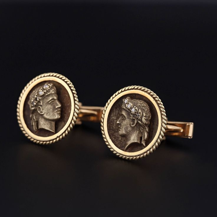 Perfect for any gentleman of fine taste! These vintage cufflinks (circa 1970-1980) depict Julius Caesar in 14k gold with diamond accented laurel wreaths atop his head. Each cufflink measures 0.9 inches by 0.9 inches wide, and they are in excellent condition.  The cufflinks have a combined weight of 15.7 grams.  We have many other fantastic offerings of period fine and costume jewelry posted on our Etsy store, so please consider browsing our other items. We send all items in individually packaged Antique Cufflinks, Diamond Cufflink, Julius Caesar, Jewelry Post, Gold Cufflinks, Vintage Cufflinks, Locket Charms, Gold Cuffs, Cufflinks Men