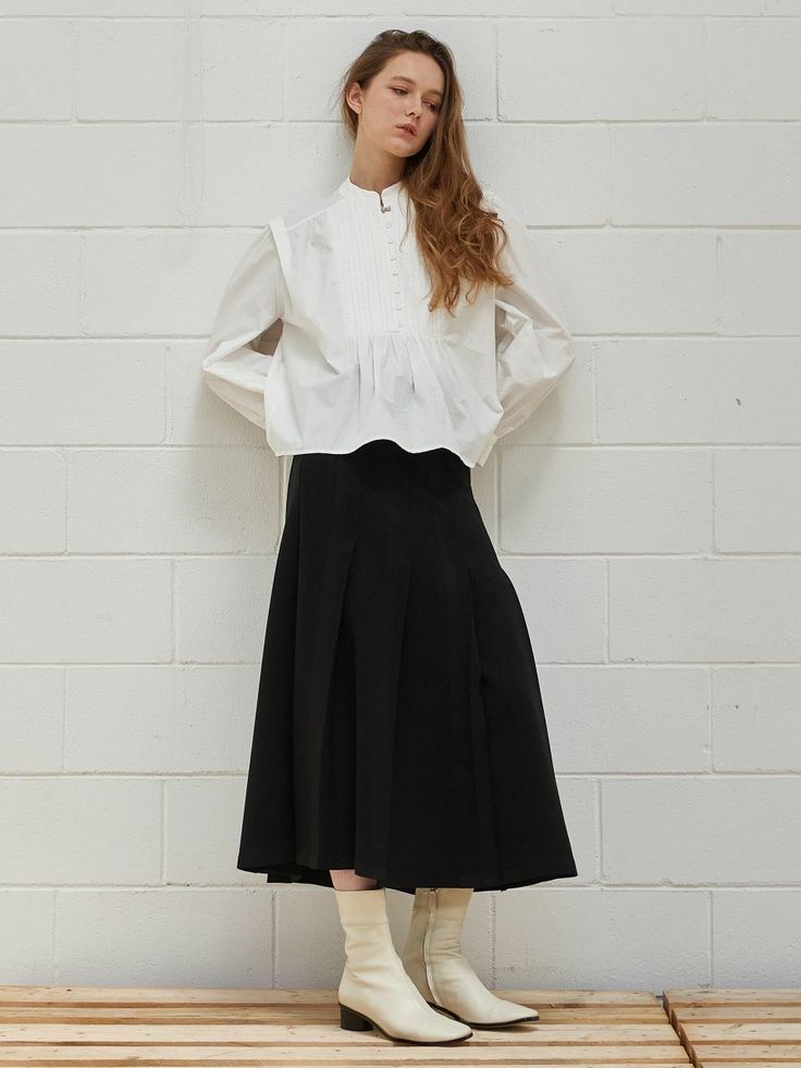 Editor's NotesClassic pleats create graceful movement and voluminous.- Zipper detail on waist- Stretchy material with feminine silhouette- Sophisticated mood with a flare fitMeasurements(in.)Size S / M- Total length: 34.25 / 34.25 in.- Waist: 28.34 / 29.52 in.- Hip: 36.22 / 37.79 in.- Hem: 85 / 85.82 in.*Model info: Height: 5'7'' / Bust: 30.31 in. / Waist: 22 in. / Hip: 35.43 in.*Depending on measurement method  may differ 1/3'Composition & Care78% Polyester  18% Rayon  4% PolyurethaneLining Elegant A-line Pleated Skirt For Daywear, Flared Ruffle Skirt For Work, Ruffled Flared Skirt For Work, Chic Pleated Flared Skirt With Ruffles, Long Ruffled Skirt For Workwear, Chic Pleated Skirt With Fitted Waist, Chic Ruffled Pleated Flared Skirt, Long Ruffled Skirt For Work, Elegant Pleated Hem Tiered Skirt