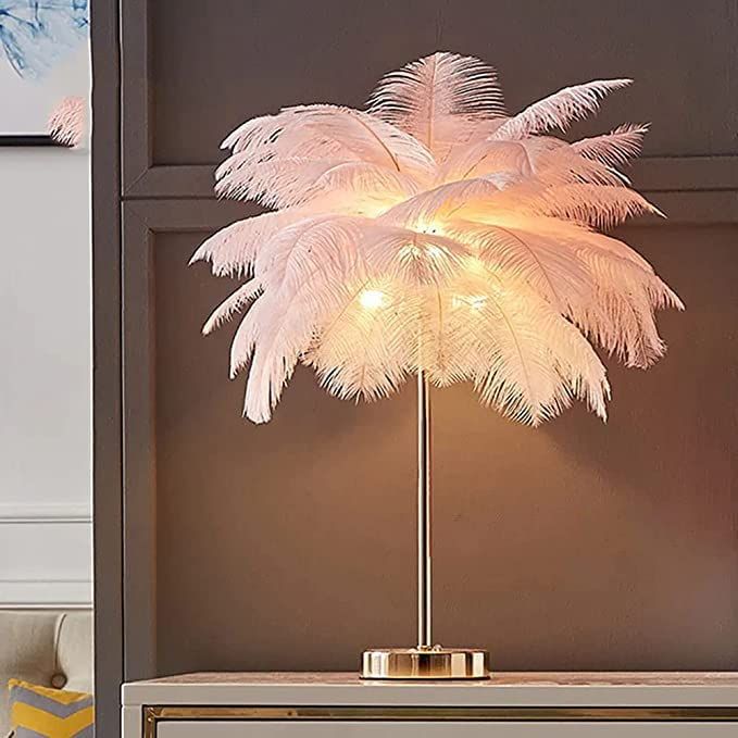 a lamp that is on top of a dresser