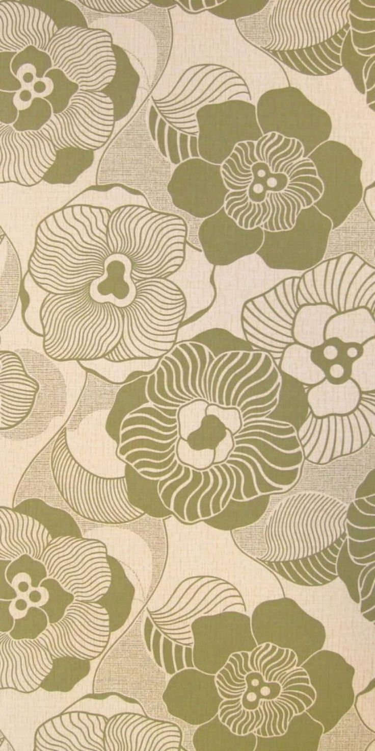 a green and white flower pattern on fabric